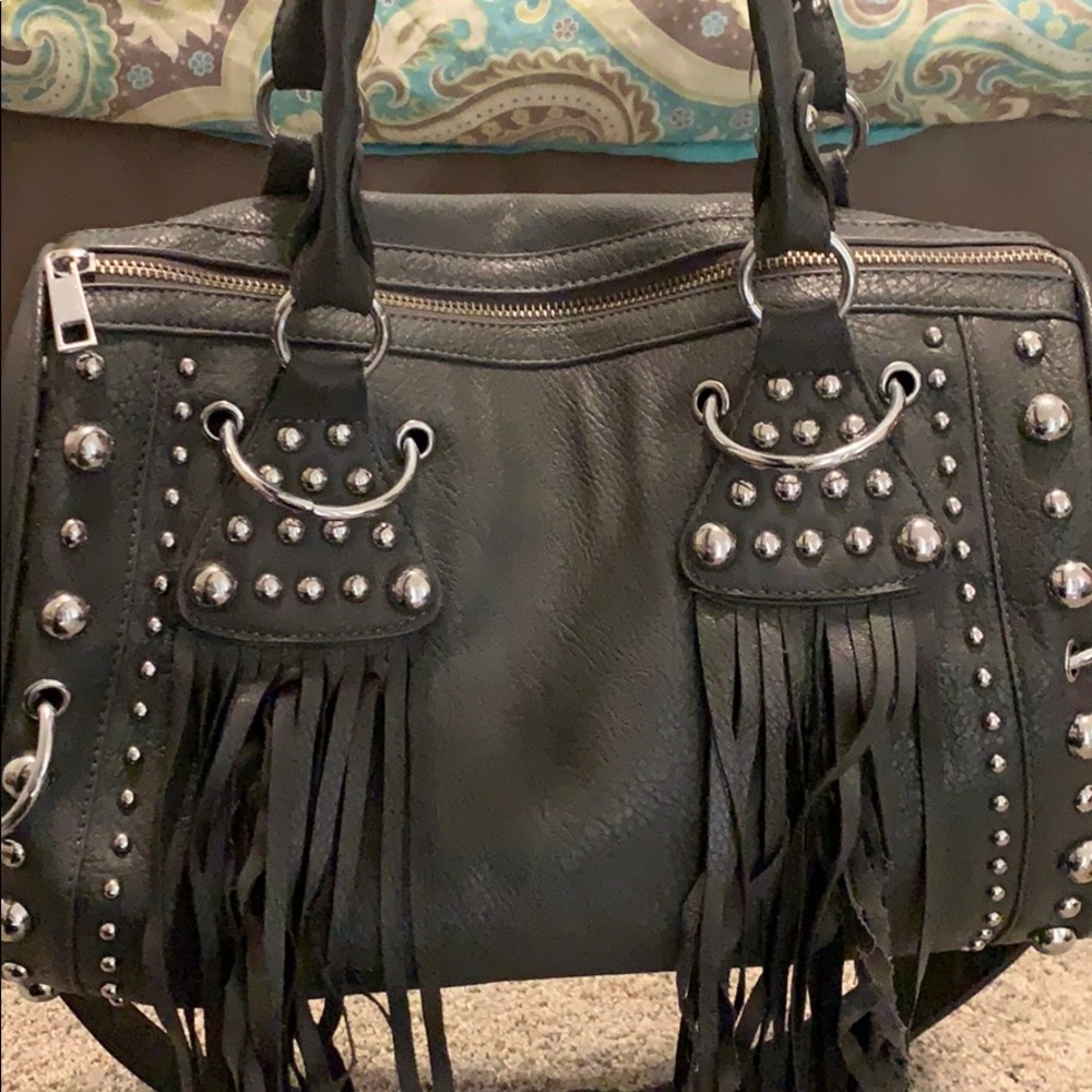 Gray tassel and studded bag